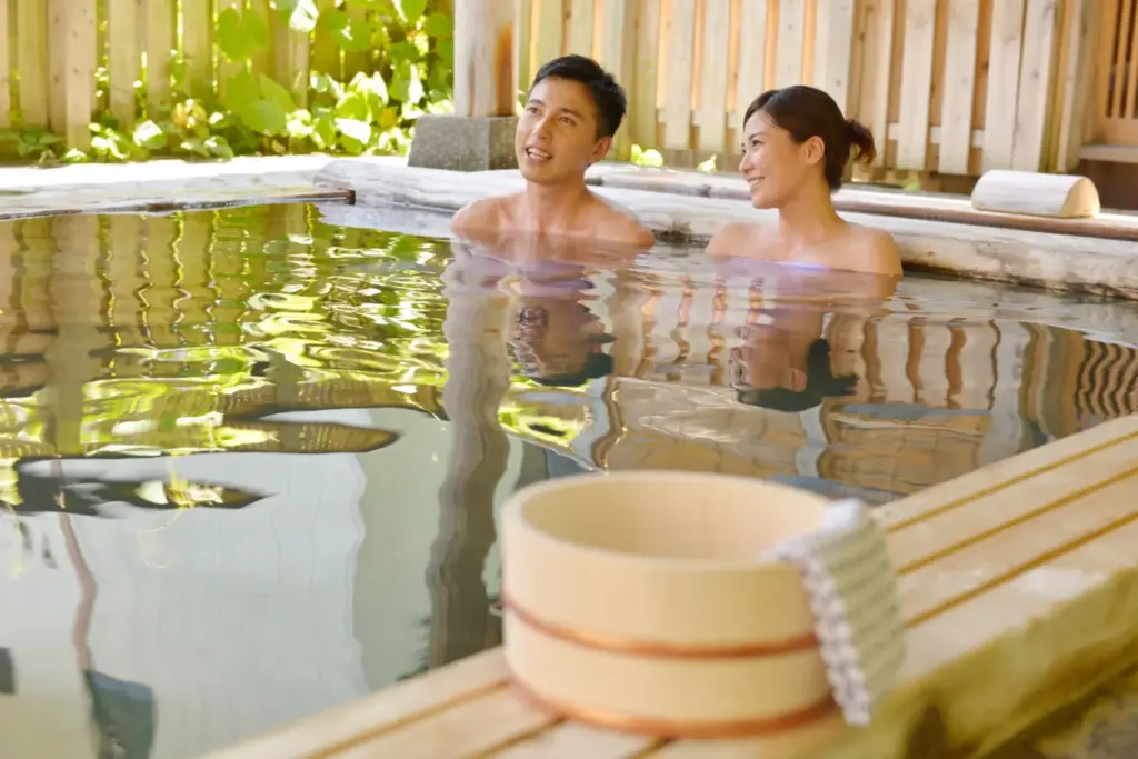 Couple bathing together in a Japanese onsen
