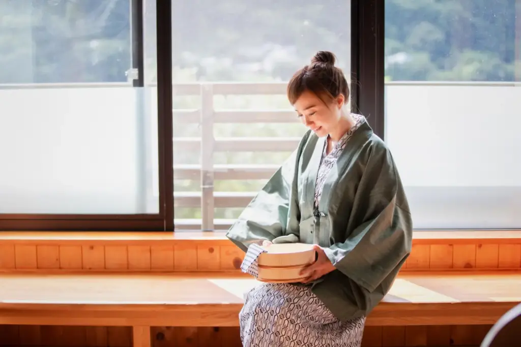 Woman arriving at a Japanese hot spring inn